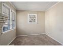 Bright living room with neutral walls and carpet at 475 Shannon Way, Lawrenceville, GA 30044