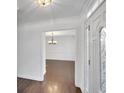 Hardwood floors and view into the dining room at 2530 Ashbourne Dr, Lawrenceville, GA 30043