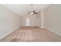 Large bedroom with neutral walls and carpet flooring at 7110 Ravenwood Ln, Lithonia, GA 30038