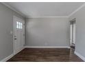 Spacious living room featuring hardwood floors and built-in shelving at 1255 Glen Forest Way, Decatur, GA 30032