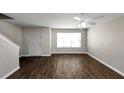 Bright living room with hardwood floors and a neutral color scheme at 4229 Reeshemah St, Union City, GA 30349
