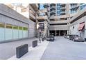 Twelve Centennial Park building entrance and parking area at 400 W Peachtree Nw St # 2313, Atlanta, GA 30308