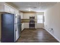 Renovated kitchen with stainless steel appliances and granite countertops at 667 Steve Sw Dr, Atlanta, GA 30315