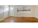 Hardwood floors and neutral walls in the living room at 1967 Glen Echo Dr, Decatur, GA 30032