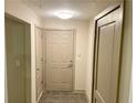 Bright entryway with tile flooring and neutral walls at 390 17Th Street # 2002, Atlanta, GA 30363