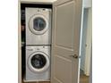 Stackable washer and dryer in a convenient closet at 565 Peachtree Ne St # 1303, Atlanta, GA 30308