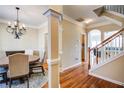 Elegant dining room with hardwood floors and chandelier at 1653 Perserverence Hill Nw Cir # 10, Kennesaw, GA 30152