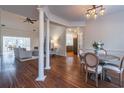 Bright dining area with hardwood floors and a round table at 1630 Victoria Chase, Cumming, GA 30041