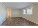 Spacious living area with hardwood floors and large windows at 1883 La Mesa Ln, Decatur, GA 30032