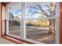 Window view of large backyard and trees at 1921 W Hightower W Trl, Conyers, GA 30012