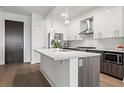 Modern kitchen with stainless steel appliances and an island at 775 Juniper Ne St # 413, Atlanta, GA 30308