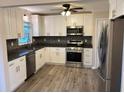 Renovated kitchen, granite countertops, stainless steel appliances at 3464 Creatwood Se Trl, Smyrna, GA 30080