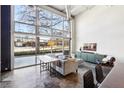 Spacious living area with large windows and city views at 5200 Peachtree Rd # 1111, Atlanta, GA 30341