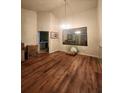 Dining room with hardwood floors, modern chandelier and large mirror at 2210 Burdett Ridge, Atlanta, GA 30349