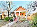 Charming craftsman home with a inviting front porch and walkway at 1736 Thompson Ave, Atlanta, GA 30344