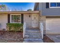 Brick front entryway with steps leading to the front door at 2778 Majestic Cir, Dacula, GA 30019