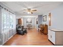 Spacious living room with hardwood floors and large windows at 2778 Majestic Cir, Dacula, GA 30019