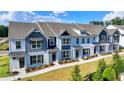 Row of charming townhouses with gray and blue accents at 1591 Salem Dr # 76, Conyers, GA 30013