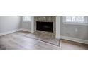 Close-up of a fireplace with a tiled hearth in a living room at 59 Stafford Nw St, Atlanta, GA 30314