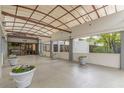 Covered entrance to Renaissance Lofts with potted plants and access to the building at 120 Ralph Mcgill Ne Blvd # 706, Atlanta, GA 30308