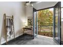 Bright home office with French doors leading to a balcony at 400 Village Ne Pkwy # 120, Atlanta, GA 30306