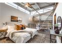 Spacious loft bedroom with high ceilings and stylish decor at 400 Village Ne Pkwy # 120, Atlanta, GA 30306