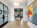 Bright entryway with hardwood floors and a view into home office at 595 Sherwood Ne Rd, Atlanta, GA 30324