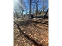 Large backyard with mature trees and detached garage at 1991 Judy Se Cir, Marietta, GA 30060