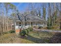 Gray house with wrap around porch and walkway at 3796 Hickory Ridge Ct, Marietta, GA 30066