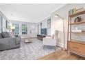 Bright and airy living room with hardwood floors and large windows at 841 United Se Ave, Atlanta, GA 30312