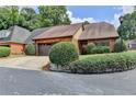 Brick home with 2-car garage and neatly landscaped yard at 6 Westchester Sq, Decatur, GA 30030