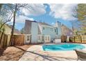 Enjoy outdoor living with this backyard featuring a refreshing pool, perfect for relaxation and entertainment at 3812 Chalmers Ct, Clarkston, GA 30021