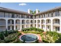 Beautiful courtyard with fountain and lush greenery at 3101 Howell Mill Nw Rd # 206, Atlanta, GA 30327