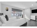 Bright bedroom with a comfortable bed, large window, and smart TV at 85 Boulevard Ne, Atlanta, GA 30312