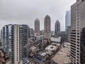 High-rise building aerial view showcasing a cityscape at 1080 Peachtree Ne St # 2016, Atlanta, GA 30309