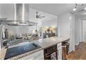 Modern kitchen with stainless steel appliances and granite countertops at 130 26Th Nw St # 804, Atlanta, GA 30309