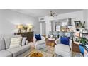 Open concept living room and kitchen with hardwood floors and stylish furnishings at 130 26Th Nw St # 804, Atlanta, GA 30309