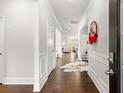 Bright entryway with hardwood floors and view into living area at 113 Overlook Ridge Way, Canton, GA 30114