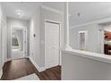 Clean and bright hallway with hardwood floors and access to patio at 2479 Peachtree Rd # 101, Atlanta, GA 30324