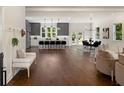 Open floor plan with hardwood floors, neutral colors, and comfortable seating at 1432 Mims Sw St, Atlanta, GA 30314