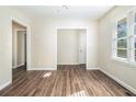 Spacious living room with hardwood floors and neutral walls at 1603 Hollyhock Ter, Decatur, GA 30032