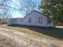 Side view of the house, showcasing the length of the home at 2455 Lake Harbin Rd, Morrow, GA 30260