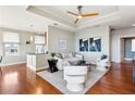 Light-filled living room with hardwood floors and contemporary furniture at 325 E Paces Ferry Ne Rd # 1608, Atlanta, GA 30305