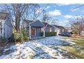 Gray bungalow with a covered porch and landscaping at 1327 Hosea L Williams Se Dr, Atlanta, GA 30317