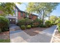 Building exterior showcasing landscaping and a walkway at 6851 Roswell Rd # F35, Atlanta, GA 30328