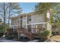 Updated 2-story condo with large deck and mature trees at 622 Powers Ferry North Se, Marietta, GA 30067