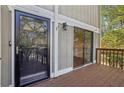 Condo entry with private deck and sliding glass door at 622 Powers Ferry North Se, Marietta, GA 30067