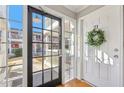 Front door with glass panes and a wreath at 885 Briarcliff Ne Rd # 21, Atlanta, GA 30306