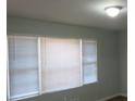 Bright living room with large windows and neutral walls at 2491 Crestdale Se Cir, Atlanta, GA 30316