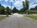 Residential street view with houses and trees at 1473 Brownleaf Dr, Jonesboro, GA 30236